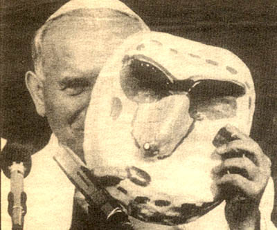 John paul II posing with a carnival mask